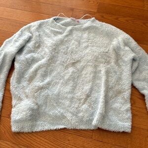 Light blue fuzzy sweater with silver star detail